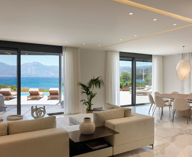 Iremia Seafront Villa Dining Area & Living Room with Floor to Ceiling Sea 